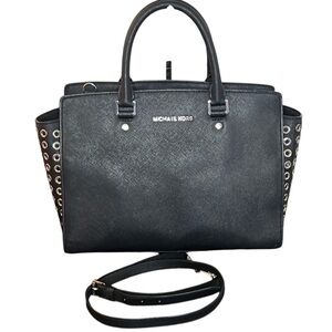 MK black Selma grommet satchel